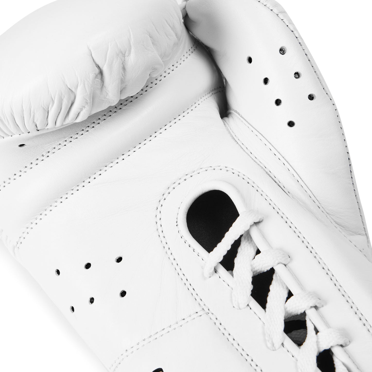 Close-up of a white leather boxing glove showing the laces, perforations, and stitching details against a white background.