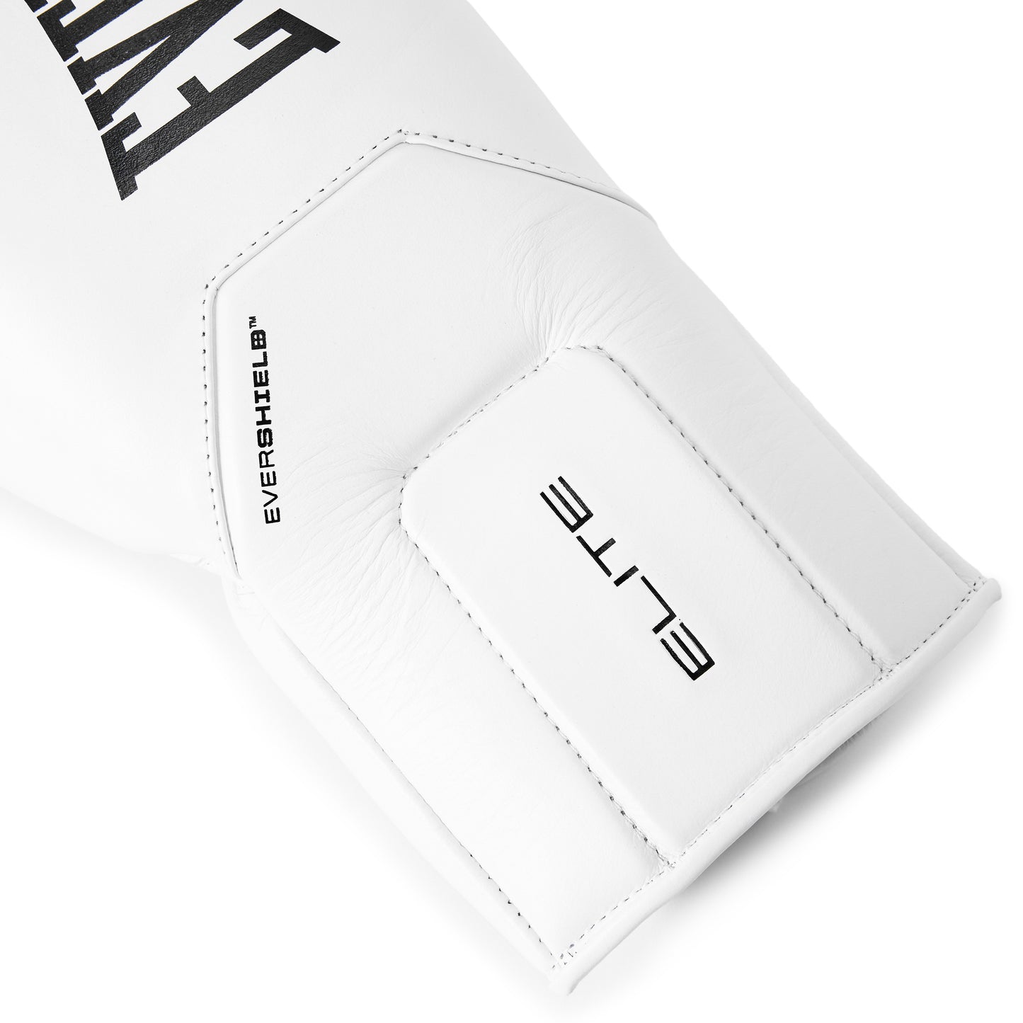 Close-up of a white EverShield boxing glove showing the wrist strap with 'ELITE' branding and the brand name 'EVERSHIELD' printed vertically.