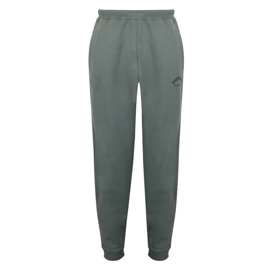 Gray sweatpants with a brand logo on a light gray background view 1
