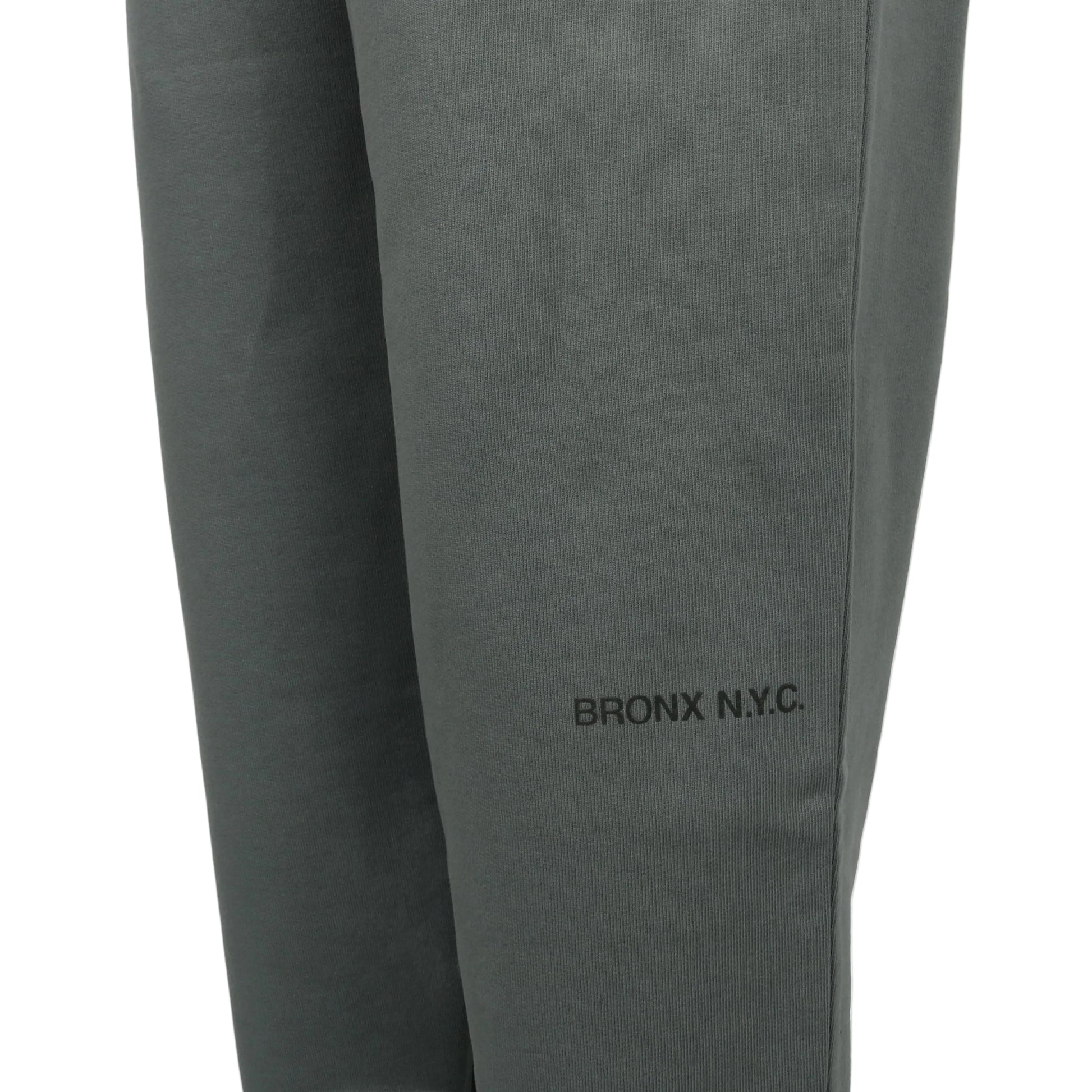 Gray sweatpants with 'BRONX N.Y.C.' text on a white background