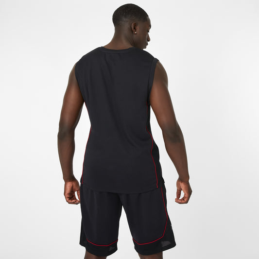 Man wearing a black sleeveless shirt and shorts with red accents on a white background view 2