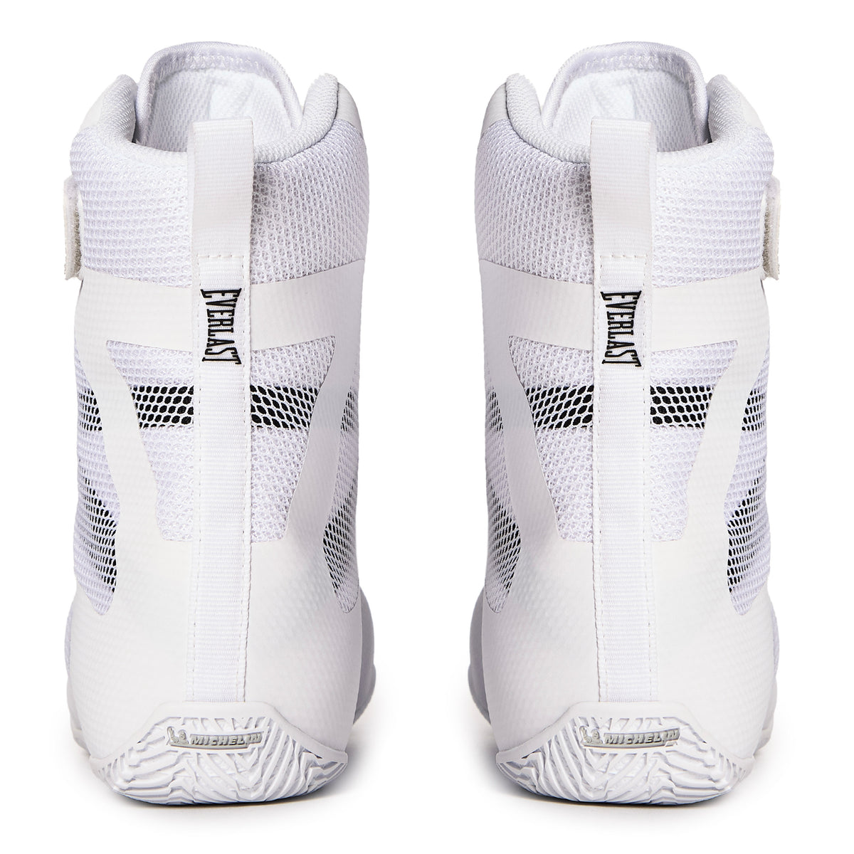 A pair of White/Black high-top athletic sneakers shown from the back, featuring mesh panels, heel support straps, and the 'MICHELIN' logo on the heel.
