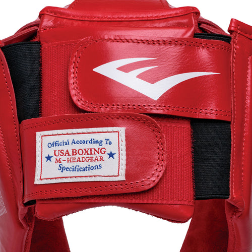 Red boxing headgear with 'Everlast' branding on a white background