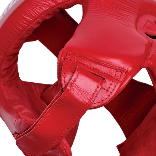 Red boxing headgear with 'Everlast' branding on a white background