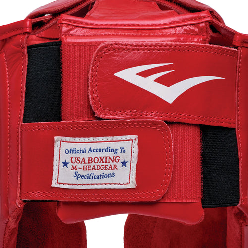 Red boxing headgear with 'Everlast' branding on a white background