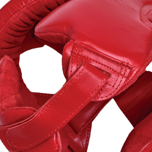Red boxing headgear with 'Everlast' branding on a white background